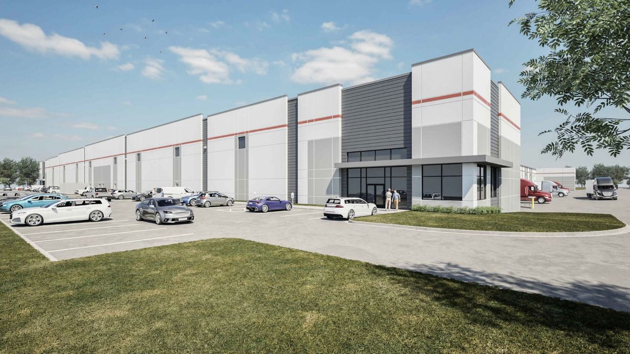Architectural rendering of the Stotan IOS industrial facility exterior with truck parking and loading areas